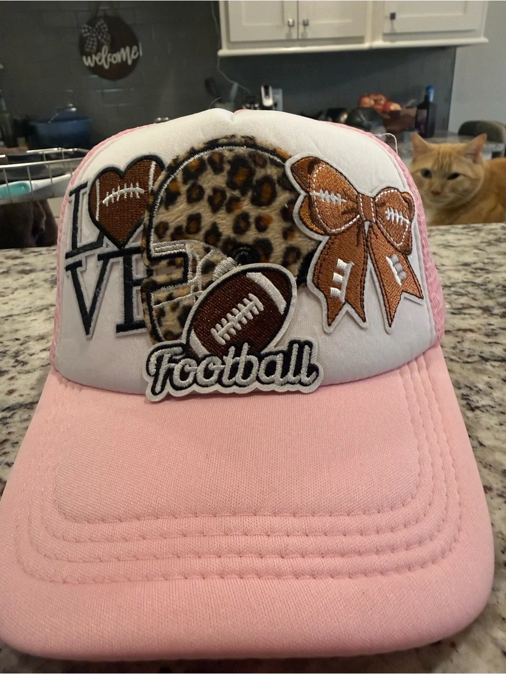 Women’s Pink Football Patch Trucker Hat - Leopard Accent
